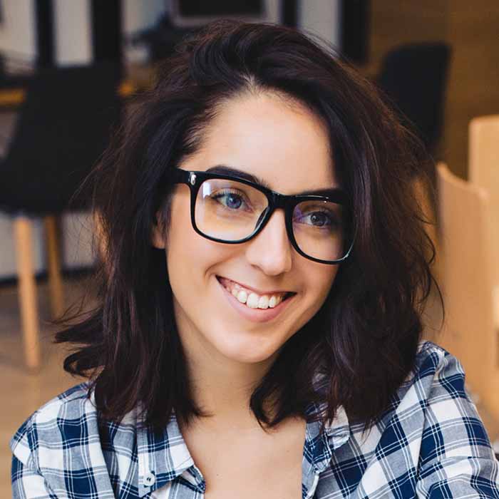 person 0016 cute friendly brunette young woman black glasses table taking books smiling client studying university worki